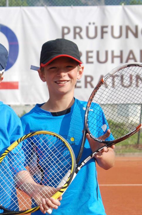 Young Nicola starting tennis